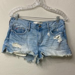 Hollister distressed raw hem denim shorts size 29. Light wash